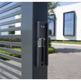 Surface mounted electric strike