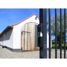 Surface mounted electric strike